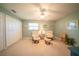 Relaxing bedroom with two comfy armchairs and built-in shelving at 7233 N Plum Tree, Punta Gorda, FL 33955