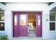 Purple double front door opens to a bright living room at 7233 N Plum Tree, Punta Gorda, FL 33955