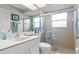 Clean bathroom with white vanity, toilet and shower at 7543 S Blue Sage, Punta Gorda, FL 33955