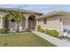 House exterior featuring double doors and a walkway at 7543 S Blue Sage, Punta Gorda, FL 33955