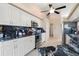 Modern kitchen with white cabinets and granite countertops at 7543 S Blue Sage, Punta Gorda, FL 33955