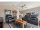 Comfortable living room with leather seating and wood coffee table at 7543 S Blue Sage, Punta Gorda, FL 33955