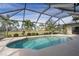 Inviting screened pool with open backyard view at 7543 S Blue Sage, Punta Gorda, FL 33955