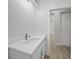 Modern bathroom with white vanity and quartz countertop at 85 Snedeker St, Port Charlotte, FL 33954