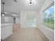 Bright dining area with sliding glass doors leading to patio at 85 Snedeker St, Port Charlotte, FL 33954