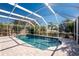 Relaxing screened-in pool with patio at 121 Cambridge Nw Dr, Port Charlotte, FL 33952