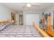 Bedroom with a log bed frame and built in shelving at 1348 Rock Dove Ct # C204, Punta Gorda, FL 33950