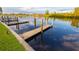 Private boat docks on calm waterway, perfect for relaxing at 1348 Rock Dove Ct # C204, Punta Gorda, FL 33950