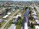 Aerial view of waterfront homes and community at 136 Godfrey Ne Ave, Port Charlotte, FL 33952