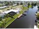 Wide aerial view of the property and surrounding neighborhood at 136 Godfrey Ne Ave, Port Charlotte, FL 33952