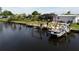 Private dock and boat lift on a tranquil canal at 136 Godfrey Ne Ave, Port Charlotte, FL 33952