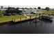 Private dock with boat lift on the canal at 136 Godfrey Ne Ave, Port Charlotte, FL 33952