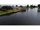 Private dock with boat lift on a canal at 136 Godfrey Ne Ave, Port Charlotte, FL 33952