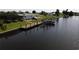 Private dock and boat lift on calm canal at 136 Godfrey Ne Ave, Port Charlotte, FL 33952