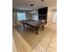 Spacious game room with pool table and fireplace at 136 Godfrey Ne Ave, Port Charlotte, FL 33952