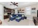 Spacious den with built-in shelving and comfortable seating at 1454 Surfbird Ct, Punta Gorda, FL 33950