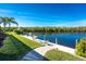 Private dock with seating area overlooking the water at 1454 Surfbird Ct, Punta Gorda, FL 33950