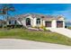 Beautiful home with two car garage and lush landscaping at 1454 Surfbird Ct, Punta Gorda, FL 33950