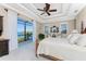 Spacious main bedroom with water views and a large bed at 1454 Surfbird Ct, Punta Gorda, FL 33950