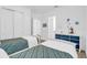 Cozy bedroom with twin beds and nautical-themed decor at 15100 River Birch Ct, Punta Gorda, FL 33955