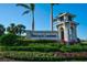 Heritage Landing entrance sign with lush landscaping at 15100 River Birch Ct, Punta Gorda, FL 33955