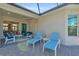 Spacious patio with lounge chairs and access to the pool area at 15100 River Birch Ct, Punta Gorda, FL 33955