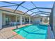 Sparkling pool with covered patio and spa at 15100 River Birch Ct, Punta Gorda, FL 33955