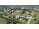 Community overview with water views and various house styles at 16322 Nogales Ct, Punta Gorda, FL 33955