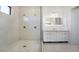 Bathroom with large walk-in shower and vanity at 16322 Nogales Ct, Punta Gorda, FL 33955