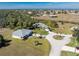 Aerial view of homes on a golf course community near the ocean at 17521 Pomegrante Way, Punta Gorda, FL 33955