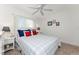 Bright bedroom with double bed and nautical-themed decor at 17521 Pomegrante Way, Punta Gorda, FL 33955