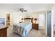 Main bedroom with a king-size bed and access to the patio at 1824 Dawnview St, North Port, FL 34288