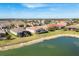 Aerial view of lakefront community and homes at 1840 Bobcat Trl, North Port, FL 34288