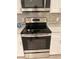 Stainless steel range and microwave combination in the kitchen at 18506 Klingler Cir, Port Charlotte, FL 33948