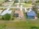 Aerial view of home with screened-in pool and manicured backyard, perfect for outdoor living at 2149 Rio De Janeiro Ave, Punta Gorda, FL 33983