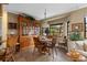 Inviting dining room features a window, a large hutch, and pendant lighting at 2149 Rio De Janeiro Ave, Punta Gorda, FL 33983