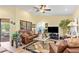 Bright living room features tiled floors, neutral paint and an airy feel at 2149 Rio De Janeiro Ave, Punta Gorda, FL 33983