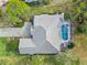 Bird's eye view of the house and pool area at 2209 Calusa Lakes Blvd, Nokomis, FL 34275