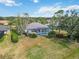 Aerial view of home with pool and fenced backyard at 2209 Calusa Lakes Blvd, Nokomis, FL 34275