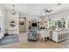 Elegant living room with decorative built-ins and view of entryway at 2209 Calusa Lakes Blvd, Nokomis, FL 34275