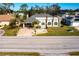 Single-story house with a driveway and landscaped yard, from above at 22498 Westchester Blvd, Punta Gorda, FL 33980