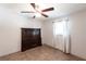 Simple bedroom with tiled floors and a ceiling fan at 22498 Westchester Blvd, Punta Gorda, FL 33980