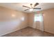 Simple bedroom with tiled floors and a ceiling fan at 22498 Westchester Blvd, Punta Gorda, FL 33980