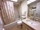 Bathroom with shower/tub combo and updated vanity at 2395 Harbor Blvd # 117B, Port Charlotte, FL 33952