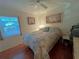 Bedroom with double bed and window with natural light at 2395 Harbor Blvd # 117B, Port Charlotte, FL 33952