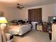 Bedroom with a double bed and dresser at 2395 Harbor Blvd # 324B, Port Charlotte, FL 33952