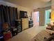 Main bedroom with dresser and bathroom access at 2395 Harbor Blvd # 324B, Port Charlotte, FL 33952