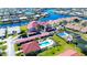 Aerial view of condo complex with pool and canal views at 2601 W Marion Ave # 45C, Punta Gorda, FL 33950