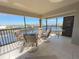 Spacious balcony with water views and seating for relaxing and enjoying the view at 2601 W Marion Ave # 45C, Punta Gorda, FL 33950