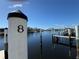 View of the numbered boat dock and waterway at 2601 W Marion Ave # 45C, Punta Gorda, FL 33950